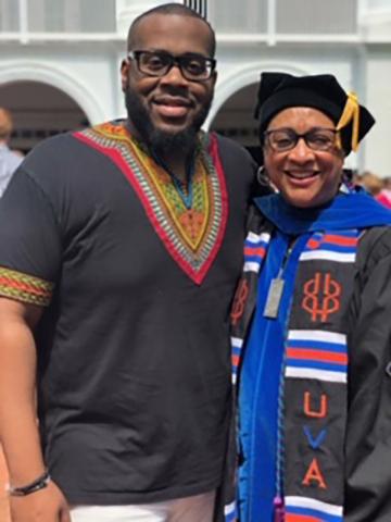 Jeffrey Smith & Grimes at 2019 Curry School doctoral hooding (his wife, Danielle got her PhD)